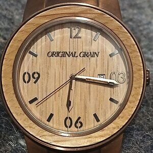 original grain  mens watch slightly worn condition